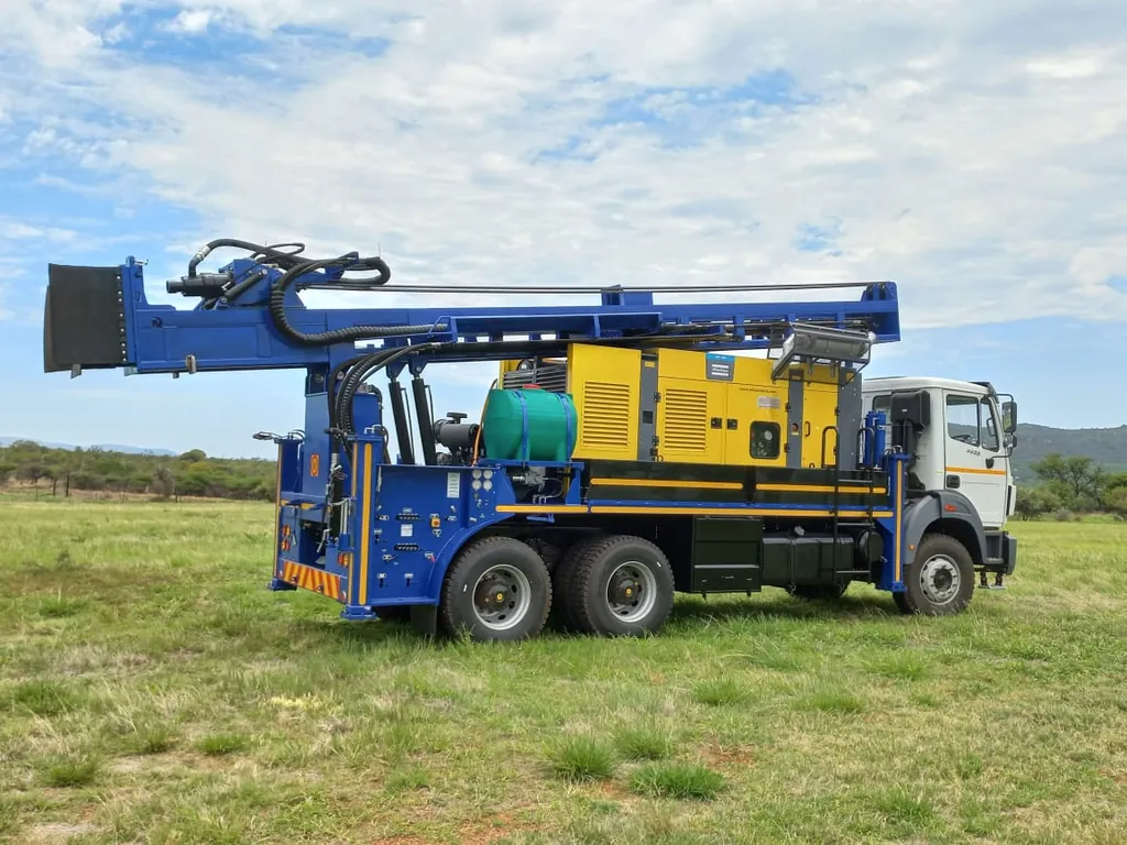 SAR200 in travel position with its on-board compressor mounted behind the cab
